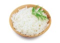 Rice in a wooden bowl isolated on white background. Top view. Flat lay Royalty Free Stock Photo