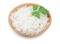 Rice in a wooden bowl isolated on white background. Top view. Flat lay Royalty Free Stock Photo