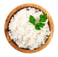 Rice in a wooden bowl isolated on white background. Top view. Flat lay Royalty Free Stock Photo