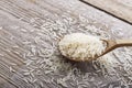 Rice in a wooden spoon Royalty Free Stock Photo