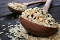 Rice in a wooden spoons . wild brown rice Royalty Free Stock Photo