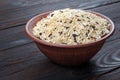 Rice in a wooden spoons . wild brown rice Royalty Free Stock Photo