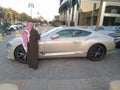 Rich Arab man , maybe seller, with nice car