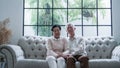 Rich Asian senior elder couple stay home for lockdown together well being family