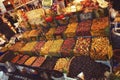 Rich assortment of pickled olives in the grocery market in Istanbul