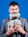 We are rich. Billioner with dollar banknotes. happy bearded man has a lot of money. businessman after great deal Royalty Free Stock Photo