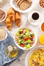 Rich breakfast assortment with selection of healthy food, coffee and juice