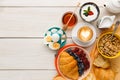 Rich breakfast menu on wooden table, copy space Royalty Free Stock Photo