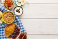 Rich breakfast menu on wooden table, copy space Royalty Free Stock Photo