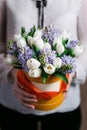 Rich bunch, green leaf in hand Fresh spring bouquet. Summer Background. composition hatbox