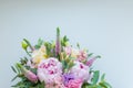 Rich bunch of pink peonies and lilac eustoma roses flowers, green leaf . Fresh spring bouquet. Holodays, gift Royalty Free Stock Photo