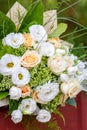 Rich bunch of white and cream rose, Eustoma flowers and green leaf. Bridal vintage bouquet. Floral backdrop