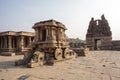 A rich carved stone chariot inside the Vittala Hindu temple in the ancient site Hampi, Karnataka, India Royalty Free Stock Photo