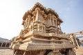 A rich carved stone chariot inside the Vittala Hindu temple in the ancient site Hampi, Karnataka, India Royalty Free Stock Photo