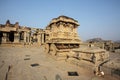 A rich carved stone chariot inside the Vittala temple in Hampi, Karnataka, India Royalty Free Stock Photo