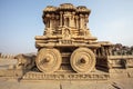 A rich carved stone chariot inside the Vittala temple in Hampi, Karnataka, India Royalty Free Stock Photo