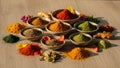 Vibrant Assortment of Aromatic Culinary Spices and Herbs on a Wooden Table Royalty Free Stock Photo
