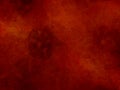 Rich dark orange red background foil texture, abstract Christmas holiday color paper Royalty Free Stock Photo