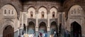 Rich decorated facade in the courtyard of the Medersa Attarine in Fes