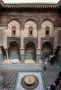 Rich decorated facade in the courtyard of the Medersa Attarine in Fes