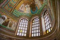 Rich decorated with mosaic walls and ceiling of the Basilica di San Vitale in Ravenna, Italy. Royalty Free Stock Photo