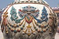 Rich decorated vase with demon head, Bodhnath Stupa, Kathmandu, Nepal Royalty Free Stock Photo