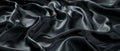 Rich folds of jet black satin draped sensuously, revealing the sultry sheen and fluid drape of the high-quality fabric.