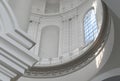 The rich interior decor of the dome with architectural details in the Baroque architectural style