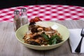 Rich Italian Seafood Pasta on Red Tablecloth