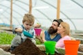 Rich land. land rich with fertile. rich land for growing plants. family in greenhouse work with rich land. family