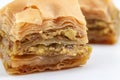 Rich layered exotic desserts, Ramadan sweets and authentic Turkish dessert concept with macro close up on slice of soft and sticky