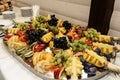 rich many fresh fruits on luxury wedding table at the reception, catering in restaurant Royalty Free Stock Photo