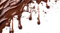 Melted Chocolate Dripping With Small Pieces on a White Surface Creates a Decadent Scene Royalty Free Stock Photo