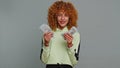 Rich pleased girl child kid waving money dollar cash bills, success, lottery winner, income, wealth Royalty Free Stock Photo