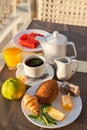 Breakfast on table at open terrace in Turkish resort Royalty Free Stock Photo