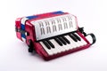 Richly colored small accordion toy Royalty Free Stock Photo