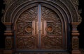 Richly decorated wooden old door, ancient brown dark door gate. Generative Ai Royalty Free Stock Photo