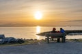 People enjoy the sunset scenery in Garry Point Park. Royalty Free Stock Photo