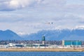 RICHMOND, CANADA - APRIL 05, 2020: Vancouver International Airport YVR with the Coast Mountains in the background