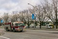 RICHMOND, CANADA - MARCH 31, 2020: Firetruck driving on a road early spring