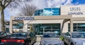 RICHMOND, CANADA - MARCH 26, 2019: modern business building with offices parking lot and cars