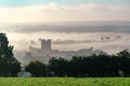 Richmond Castle and town nestled in low lying fog Royalty Free Stock Photo