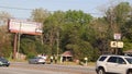 Richmond County Correctional Prison Inmates cleaning up on the side of the road, inmate motions for a cigarette to passing cars 2