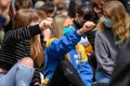 Caucasian female protesters wear PPE Face Masks and salute at a Black Lives Matter protest