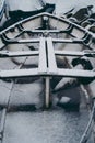 Boats covered in snow and moored on the river in West part of the city