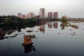 Richmond, Virginia skyline with James river in foreground.