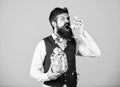 Richness and wellbeing. Security and cash money savings. Banking concept. Man bearded guy hold jar full of cash savings