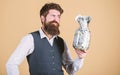 Richness and wellbeing. Security and cash money savings. Banking concept. Man bearded guy hold jar full of cash savings Royalty Free Stock Photo