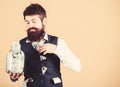 Richness and wellbeing. Security and money savings. Banking concept. Man bearded guy hold jar full of cash savings. Safe Royalty Free Stock Photo