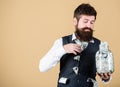 Richness and wellbeing. Security and money savings. Banking concept. Man bearded guy hold jar full of cash savings. Safe